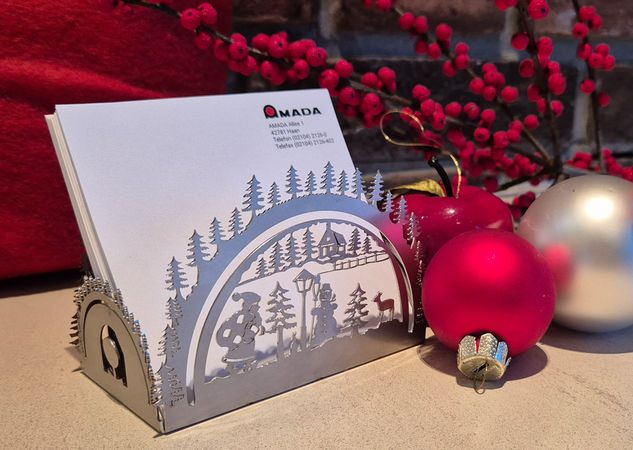Nikolaus and the AMADA note holder